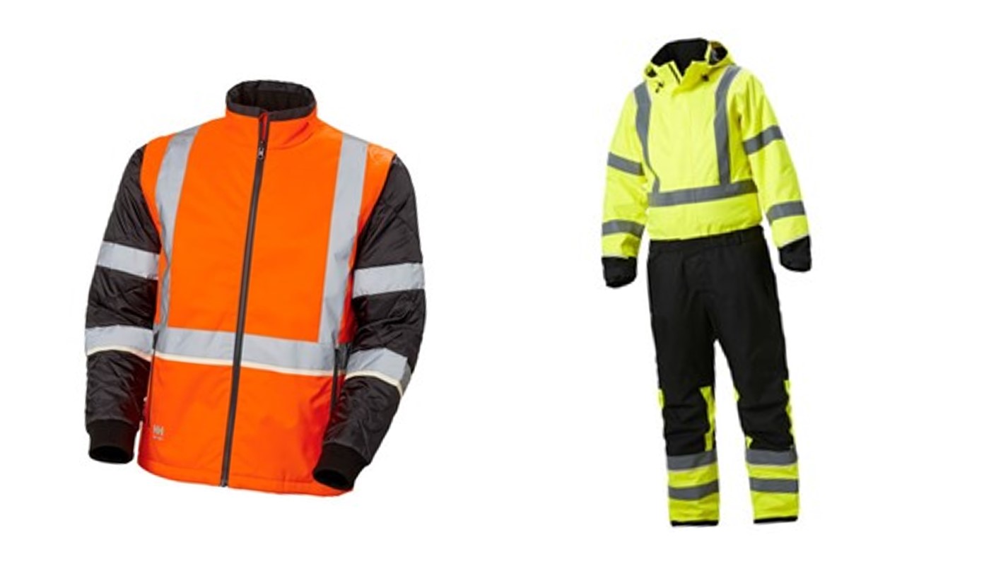 : Blog banner with image of three workers in hi-vis jackets, warm clothing, gloves, and helmets in the snow reading from a document. The text says “Cold Weather Safety Gear For Outdoor Workers”