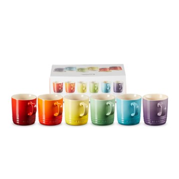 Image of a set of six Le Creuset mugs in a variety of colours.